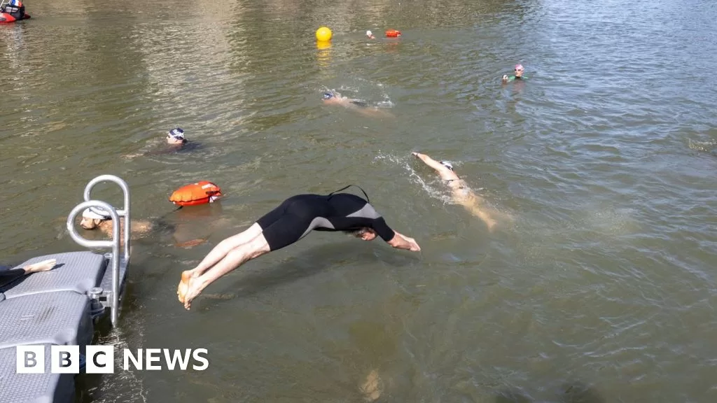 Olympics parisians embrace the seine a dip in the citys revitalized river 2024 07 22 18 00 32